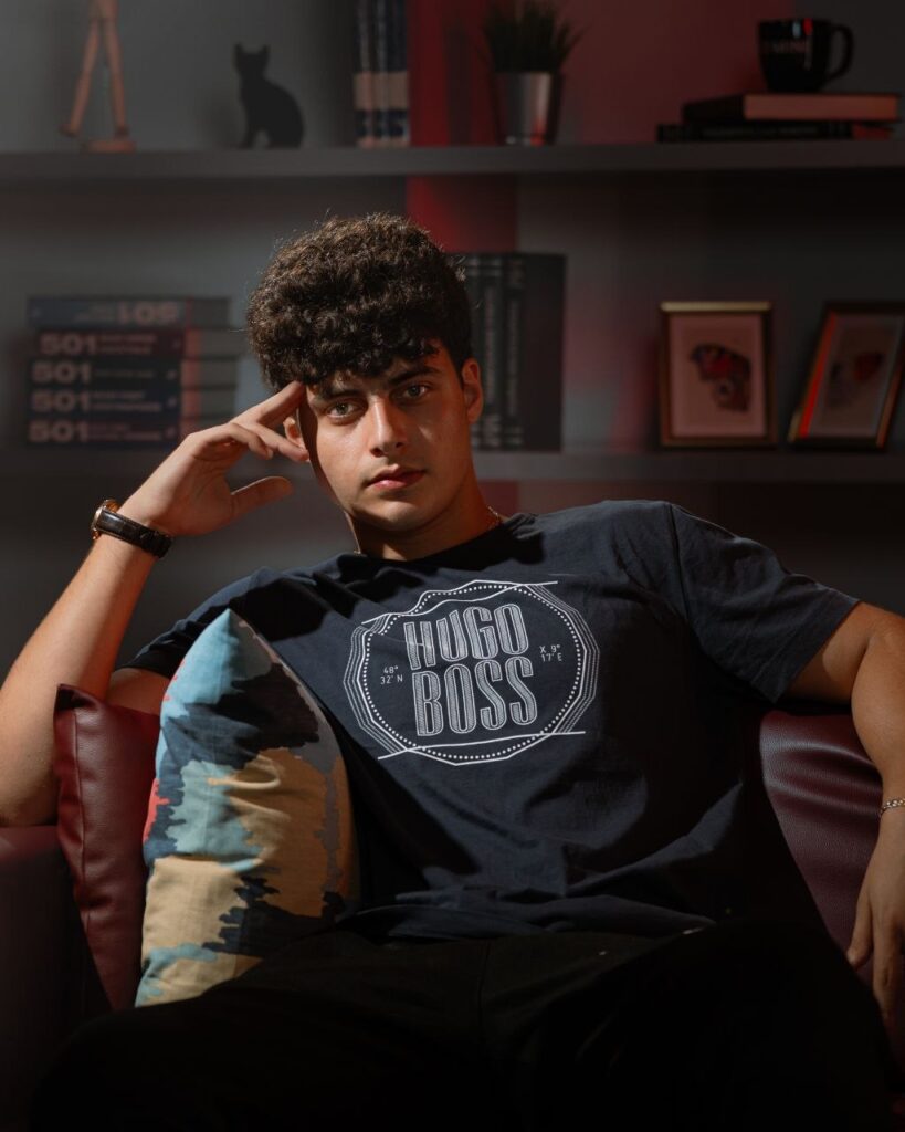 Male model on a leather sofa in the StudioLebanon lounge set in Zouk Mosbeh
