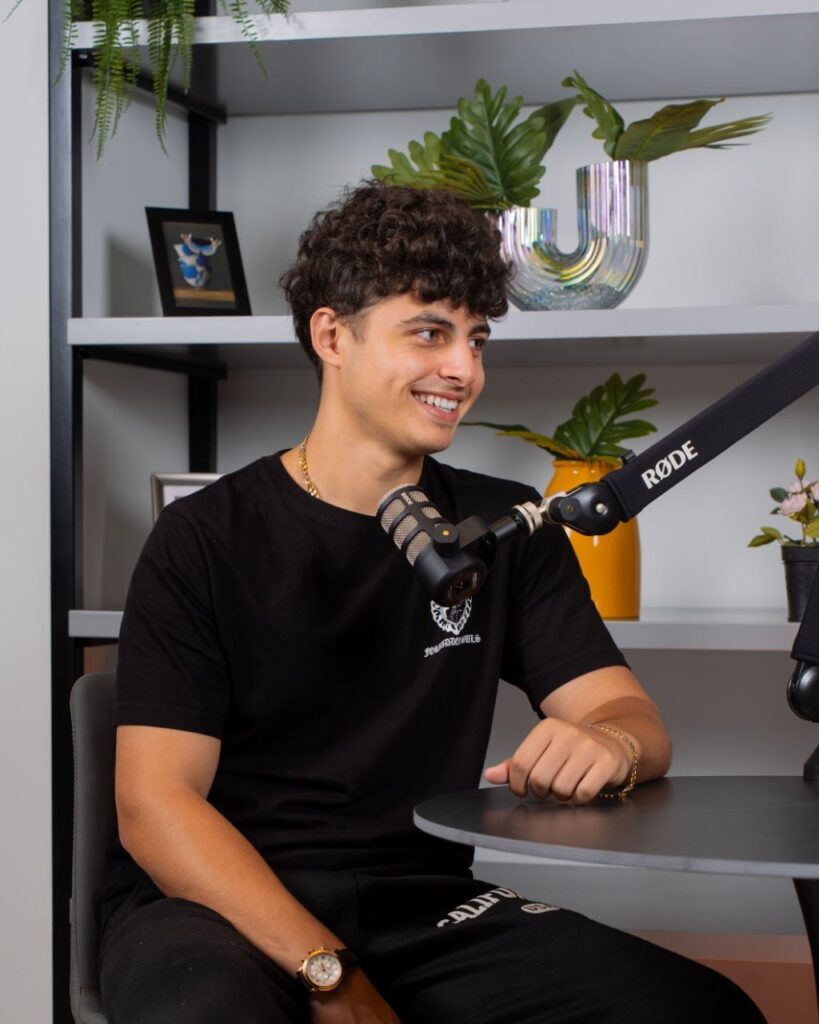 Podcast guest recording an episode at StudioLebanon with a Rode microphone